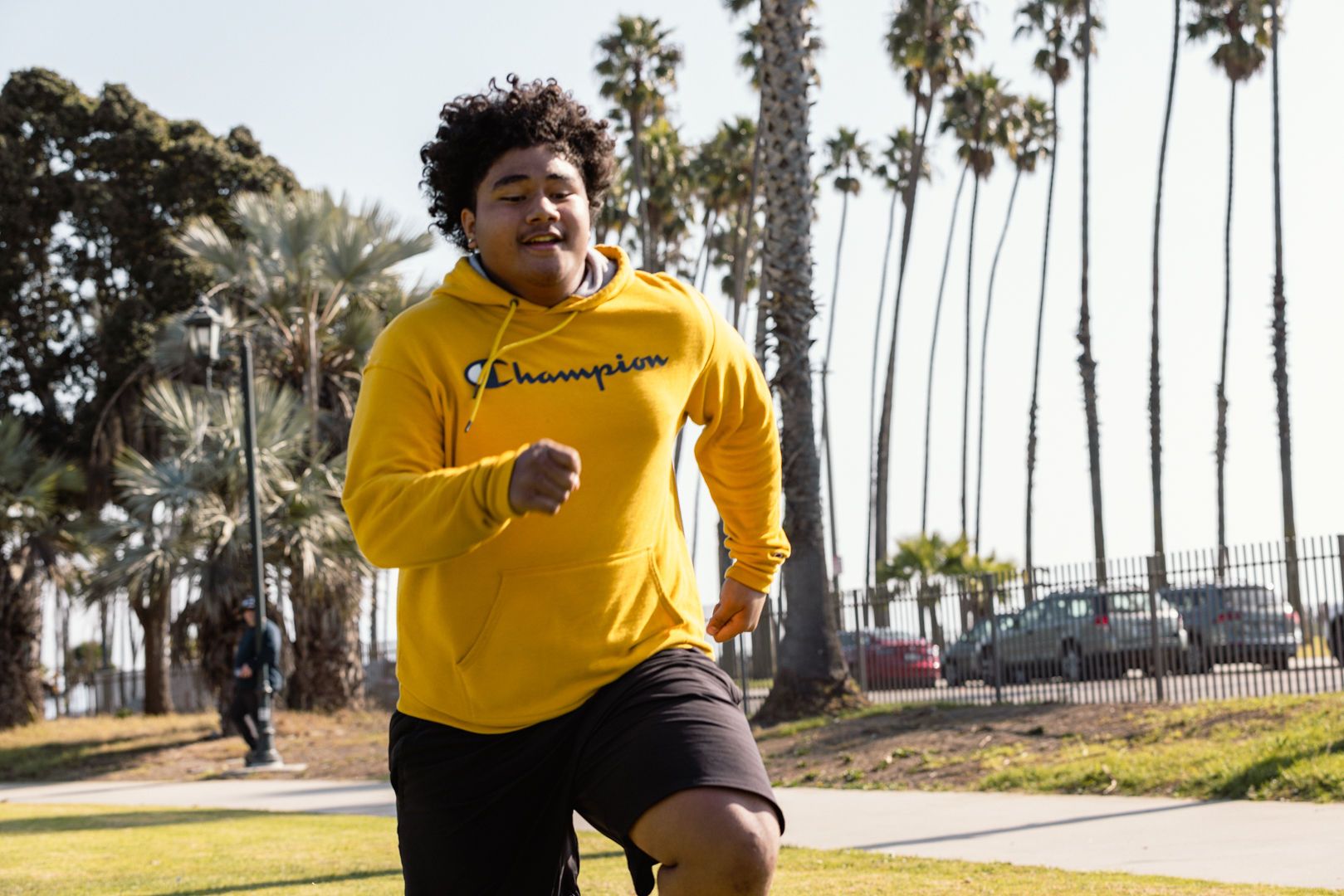 Athlete sprinting across the grass